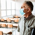 Man wearing Mask Looking at Window Films