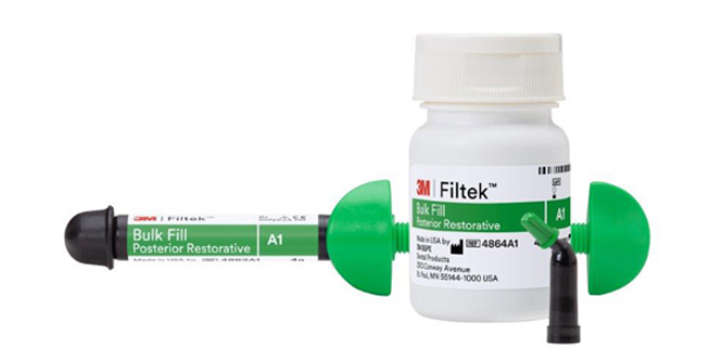 close up of hands holding 3M™ Filtek™  One Bulk Fill Restorative syringe
