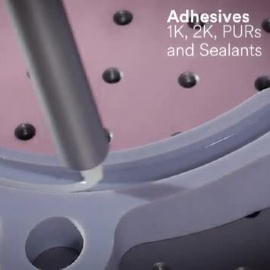 Video still showing the machine applying adhesive to a part with screen text “Adhesives: 1K, 2K, PURs and Sealants”
