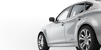 灰色轿车的侧视图。