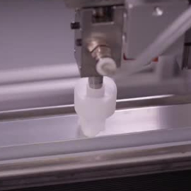Video still showing the in-line priming capability ahead of tape application