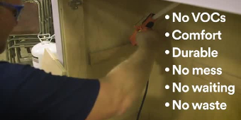 Video still of a worker applying hot melt adhesive to wood with text No VOCs-Comfort-Durable-No mess-No waiting-No waste