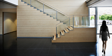 Woman walking on glossed floors
