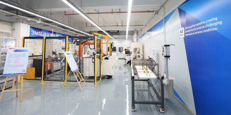 Image of the room including several machines at the Shanghai Bonding Process Center
