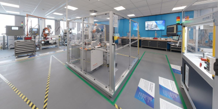 Image of the room including several machines at the Neuss Bonding Process Center

