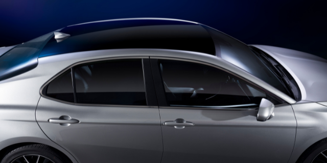 Silver sedan with 3M body contrast film.