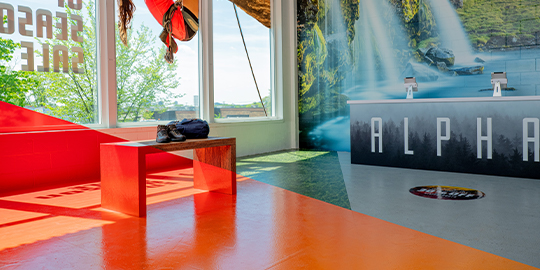 Interior retail space using wall wraps, window wraps and graphic wraps to promote outdoor adventures.
