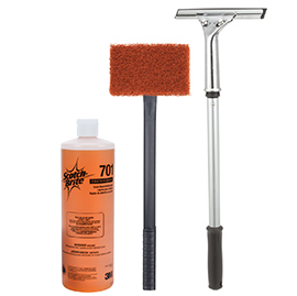 Scotch-Brite™ Quick Clean Griddle Liquid, Quick Clean Heavy Duty Griddle Pad, Multi-Purpose Pad Holder and Squeegee.