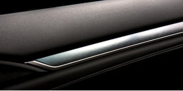 Chrome interior car door with 3M interior trim film.