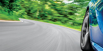 Sedan driving on a highway
